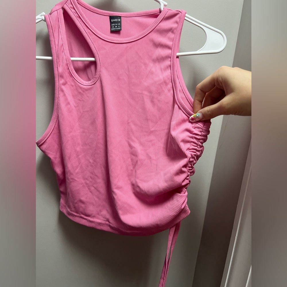 pink ripped crop with shoulder cut out and tie up. shein size M